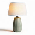 Ceramic table lamp with textured green base and fabric shade 25 x 25 x 40cm